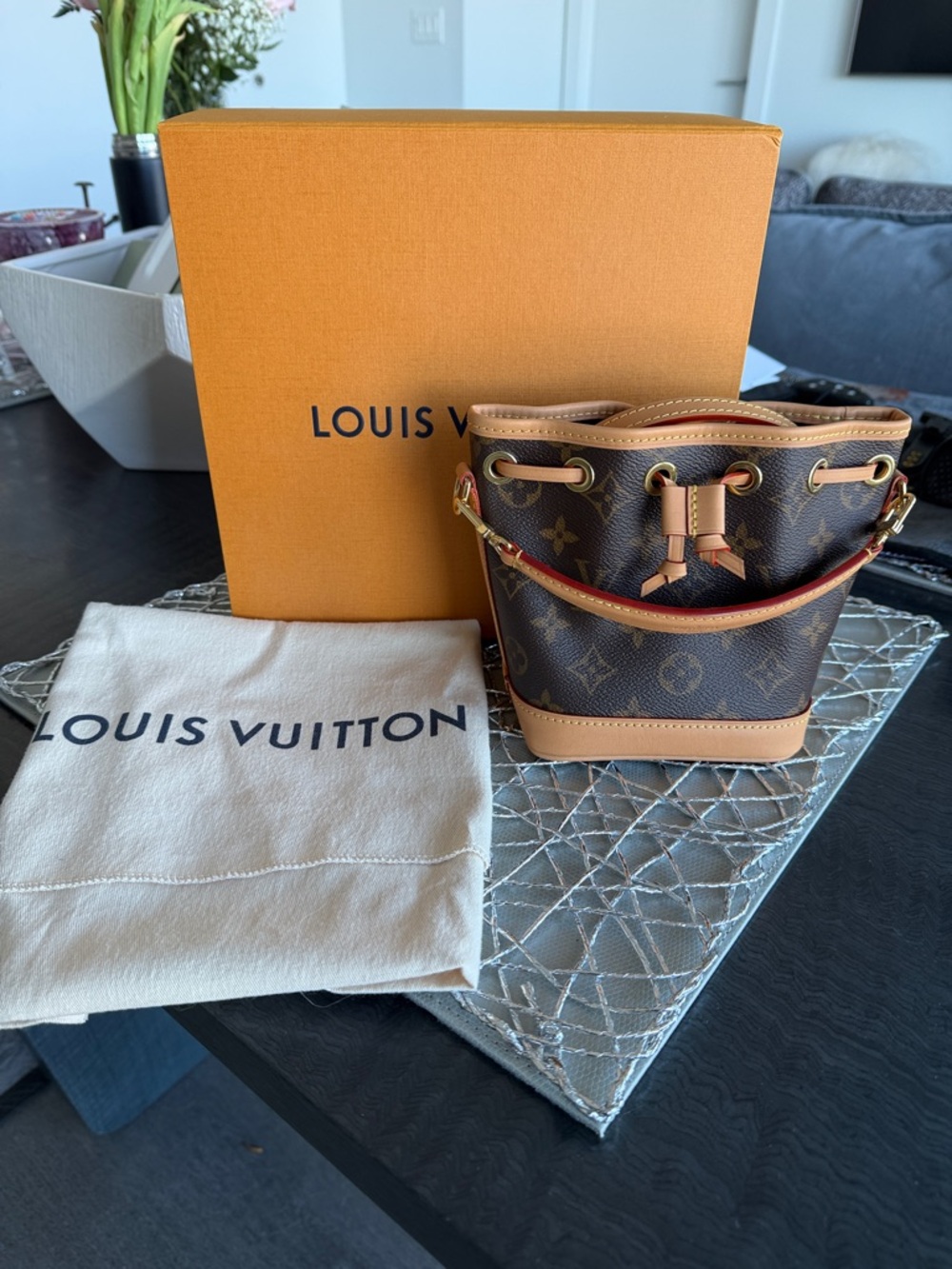 Louis Vuitton Monogram Mini Bucket Bag in Brown and Tan with Red Trim